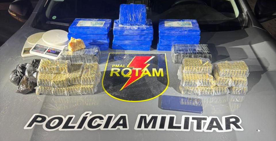 Traficante com munições e carga de drogas escondida em caminhão