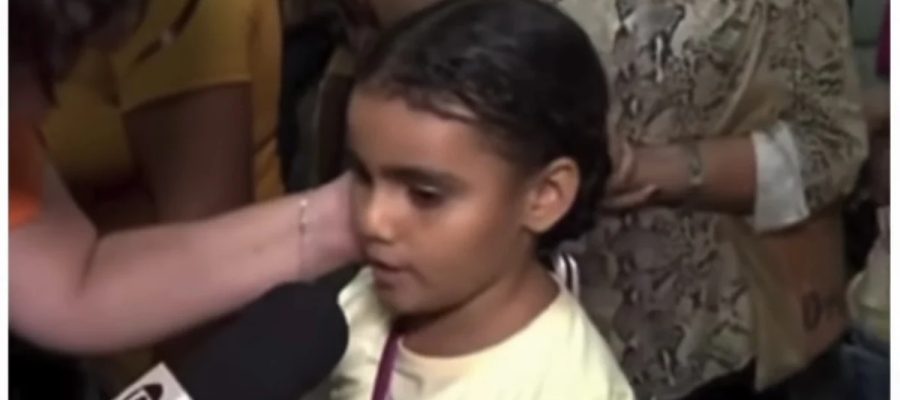 Menina de 8 anos emociona ao falar da saudade da mãe durante festa religiosa